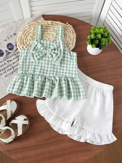 2pcs/Set Young Girls Bow Trim Checkered Cami Top And Solid Color Comfy Ruffle Hem Shorts Set, Summer