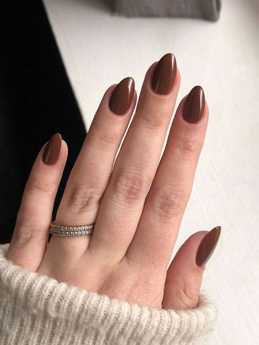 Bộ 24 miếng dán móng tay acrylic ngắn hình bầu dục màu nâu sô cô la bóng, bao gồm 1 miếng gel dẻo và 1 dũa móng, phù hợp cho phụ nữ và các bạn gái sử dụng hàng ngày khi đi làm, học tập và dự tiệc. - Màu nâu Sô-cô-la - Xem 1