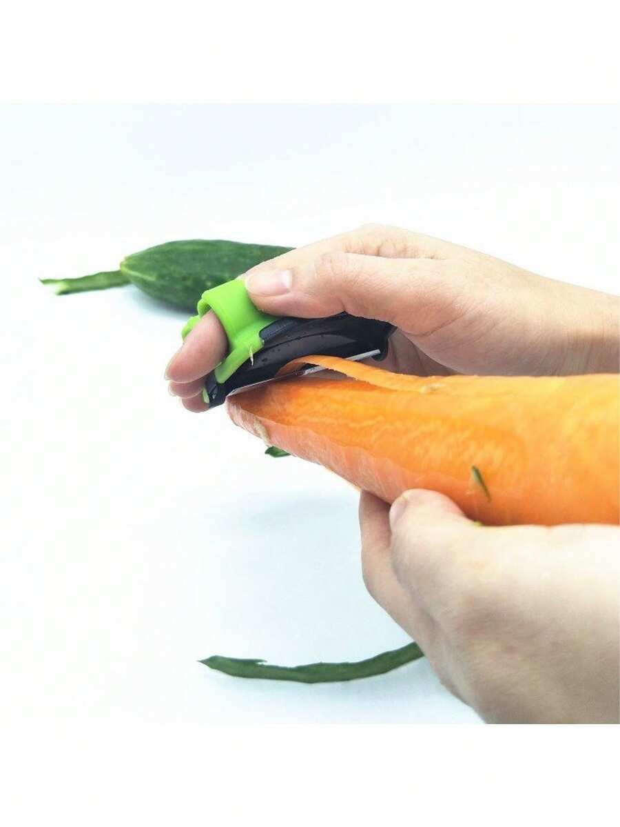 Easy-To-Use Peeling Tool With A Comfortable Grip And Non-Slip Rubber Finger Ring Design, Suitable For Peeling Vegetables And Fruits. A Convenient Kitchen Gadget, Easy To Carry, Perfect For Camping, RVs, And Outdoor Use. - Multicolor - View 1