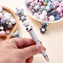 28件/套硅胶动物珠套装，包含站立考拉造型珠子、15毫米印花圆珠和玻璃水钻隔珠，是家庭聚会、DIY珠宝制作、钢笔、手链、项链等的最佳礼物。 - 彩色 - 查看 2