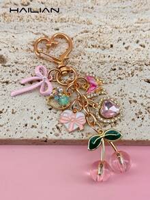 HAILIAN 这款锌合金心形扣饰有蝴蝶结、爱心、蝴蝶和樱桃图案，优雅独特，可作为女士手提包/钱包/钥匙扣挂饰。适合装饰手提包、钱包、钥匙，也可作为旅行配件。是送给朋友、女友或情侣的完美小礼物。 - 粉色 - 查看 3