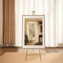 ZHFEISY 50 In Tall Gold Easel Stand For Sign, Posters, Adjustable Metal Display Easel Stand With Bow Top, Portable Art Easel, Foldable Freestanding Welcome Sign Stand For Wedding (1PCS 16.34x50 In) - 41.5*60*127cm - View 2