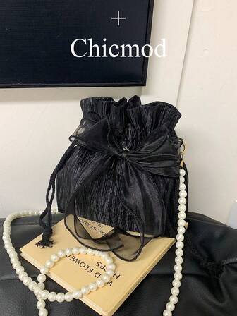 This Fashionable And Elegant Women's Crossbody Bag Is Made Of Polyester Fabric, Decorated With A Bow, Drawstring Closure, And Features A Beaded Chain Strap, Suitable For Occasions Such As Banquets, Parties, And Weddings.