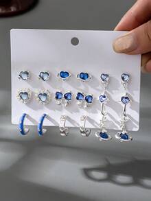 9对可爱少女心形、蝴蝶结、小行星造型耳环套装，适合女性日常佩戴或作为礼物送给朋友