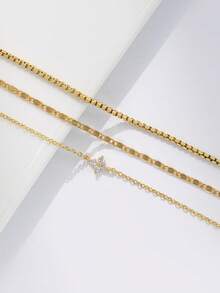 Nooxian Set de 3 tobilleras para mujer, estilo apilado bohemio para verano y playa, con trébol incrustado de cobre y circonita, cadena plana dorada electrochapada brillante, y cadena hueca delgada multicapa como accesorio de regalo - Amarillo Oro - Ver 4