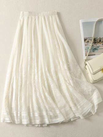 Nueva falda midi de línea A de malla de alta gama con vuelo para mujer, perfecta para celebraciones festivas