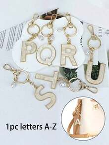1pc 26 English Alphabet Faux Pearl Alloy Keychain Paired With Bowknot Ornaments, Popular Accessory, Backpack Charm Car Hanging Pendant Women Girls,Wallet And Handbag Accessories,Couple Pendant, Bag Pendant, Headphone Pendant,Suitable As A Family, Friends, Lovers, Mother's Day Gifts, Teacher Gifts, Birthday Gifts, Holiday Gifts - 金色 - 查看 13