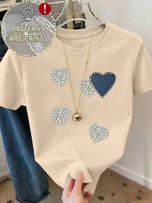 Camiseta blanca Nueva camiseta de mujer de diseño de cuello redondo con un estampado de corazón elegante, perfecta para uso casual y versatilidad diaria en una cómoda camiseta de manga corta. - Rosa Fucsia - Ver 2