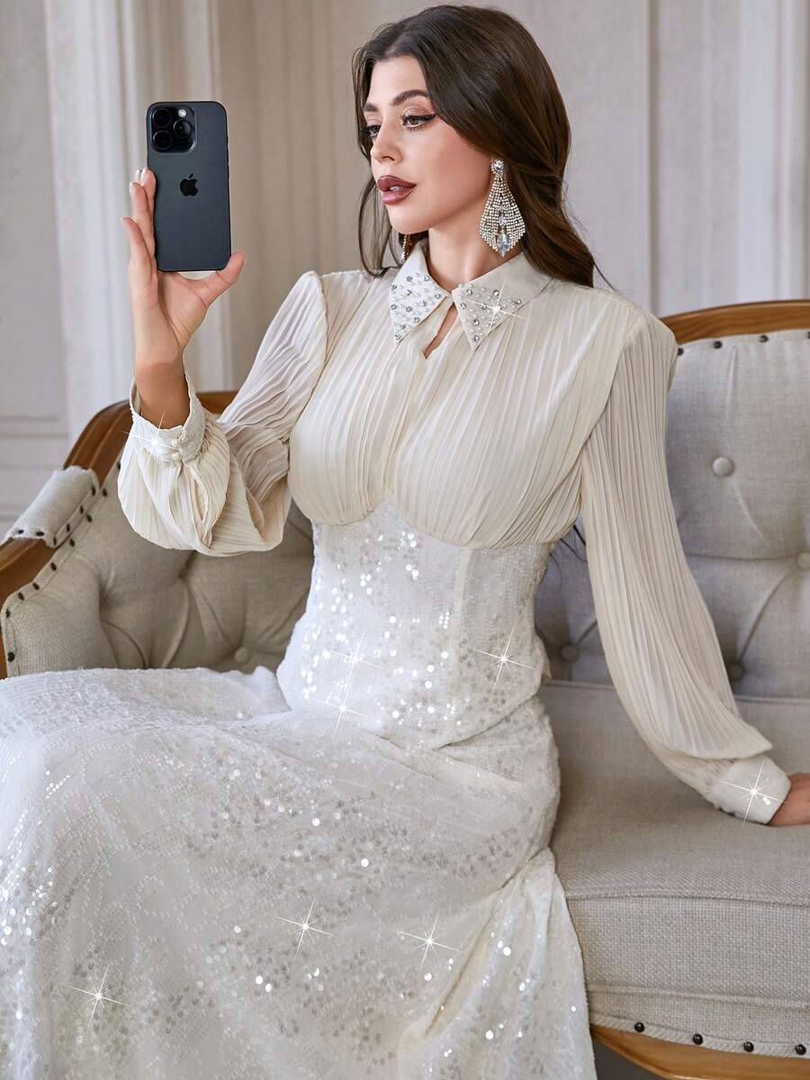 Bộ váy áo polo cổ bẻ 2 món dành cho nữ, gồm chân váy xếp ly thêu đính sequin và áo dài tay cạp cao, thích hợp cho đám cưới, tiệc chiêu đãi, liên hoan và nhiều dịp khác. - Màu be - Xem 1