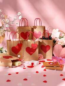 350克/平方米，15磅容量，红色心形礼品袋，带提手，是情人节、婚礼回礼、生日派对的理想之选，也是节日必备佳品。