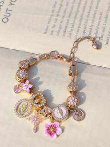 1 vòng tay mặt dây chuyền hình thánh giá Chúa Giê-su, 1 vòng tay hình trái tim hoa anh đào, 1 vòng tay kỷ niệm chữ cái tiếng Anh LOVEMOM, 1 vòng tay hình thánh giá thiên thần trái tim, 1 vòng tay xoắn ốc. - Vàng - Xem 8