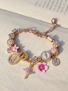 1 vòng tay mặt dây chuyền hình thánh giá Chúa Giê-su, 1 vòng tay hình trái tim hoa anh đào, 1 vòng tay kỷ niệm chữ cái tiếng Anh LOVEMOM, 1 vòng tay hình thánh giá thiên thần trái tim, 1 vòng tay xoắn ốc. - Vàng - Xem 6