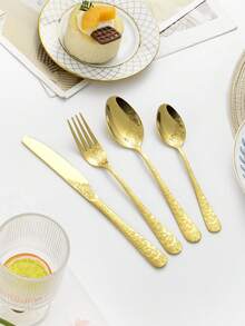 4/16/24件套不锈钢餐具套装，包括餐刀、餐勺、餐叉和甜点勺，适用于厨房、餐厅、自助餐，也可作为斋月礼物，手柄刻有精美图案。 - 金色 - 查看 2