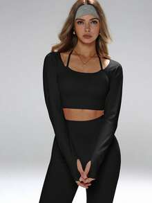 Bộ đồ thể thao năng động, thanh lịch dành cho việc tạo dáng bụng thon gọn, bao gồm áo crop top hở eo có lỗ xỏ ngón tay cái, quần legging ôm sát cạp cao và áo ngực thể thao có đệm có thể tháo rời. - màu đen - Xem 7