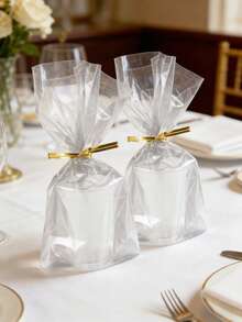 100个装 - 优雅透明礼品袋，配金色扭绳，OPP塑料材质，带扭绳，适用于母亲节、婚礼、生日、毕业典礼、新娘送礼会、派对用品、购物等场合，可用作礼品袋、礼品包装袋或午餐盒、烘焙包装袋、手提袋等。 - 彩色 - 查看 7