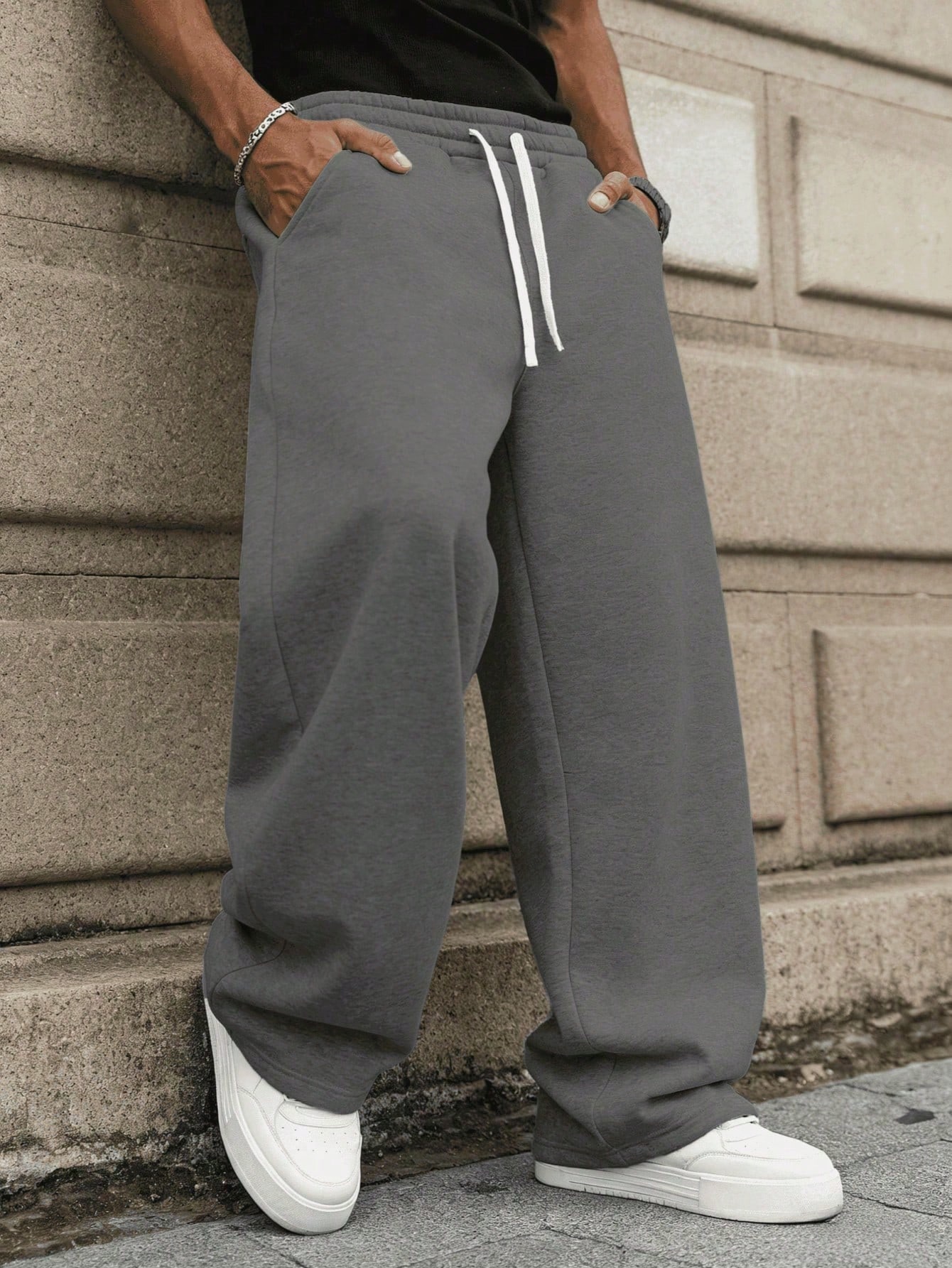 1 قطعة بنطلون رجالي فضفاض كاجوال أحادي اللون واسع...