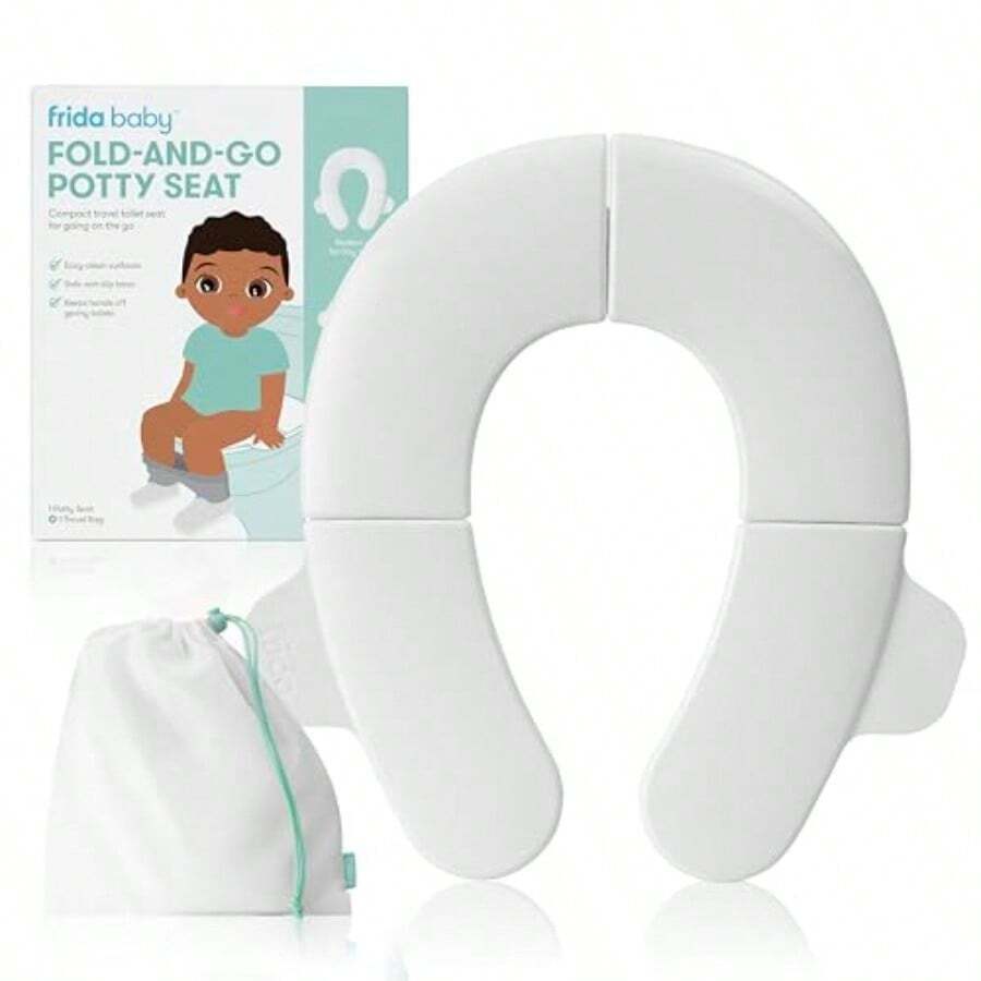Frida - Asiento portátil plegable para inodoro para bebé asiento plegable para orinal de viaje para niños pequeños se adapta a inodoros redondos y ovalados base antideslizante asas incluye bolsa - Blanco - Ver 1