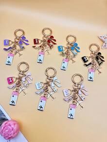 1件优雅粉色蝴蝶结旅行钥匙扣吊坠，油滴飞机行李牌护照埃菲尔铁塔DIY饰品，女士手提包挂饰，行李箱装饰，单肩包配件，多功能包包挂饰，汽车装饰，可爱哥特Y2K风格，节日礼物 - 彩色 - 查看 10