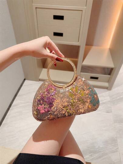 一款优雅多彩亮片手拿包，适合女性、女孩、大学生、新婚夫妇和上班族在派对、舞会、婚宴等场合使用。这款手拿包可作派对包、舞会包、晚宴包、派对女孩专属包、女士专属包，是派对、婚礼、舞会、招待会的完美之选。也是馈赠女士的最佳选择，与女士礼服完美搭配。图案随机发送。