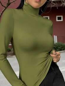 Áo thun nữ dài tay cổ cao màu trơn, dáng ôm, rộng rãi và thoải mái, đơn giản và dễ phối đồ, phù hợp cho mùa xuân, thu và đông, có thể mặc đi chơi tối, đi nghỉ mát, hàng ngày, đi làm, ở nhà, dạo phố, du lịch, ở sân bay, ăn trưa, v.v. Phong cách: Thường ngày/Tối giản/Y2K/Thanh lịch/Quyến rũ/Thời trang đường phố/Dễ thương/Sành điệu, phù hợp cho nữ mùa thu/đông, Halloween, Giáng sinh, ngày lễ giáo, áo khoác ngoài, hẹn hò, áo cơ bản, phong cách Hàn Quốc. - màu xanh lá - Xem 2