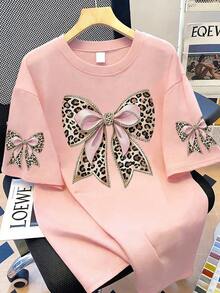 大码女式休闲豹纹蝴蝶结装饰圆领T恤，适合夏季度假、新年、情人节、母亲节等场合作为礼物