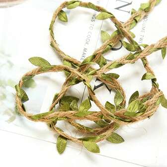 Grof jute lint met bladeren - Groen touw met kunstmatige groene bladeren, geschikt voor een jungle-avontuur themafeest of huisdecoratie.