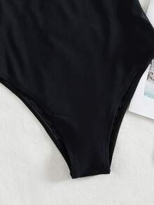 Onefish 2026 Nuevo traje de baño de una pieza elegante para mujer con cuello en V y decoración de anillo de metal, para verano, vacaciones en la playa, ropa de playa, traje de baño de una pieza para mujer, traje de baño de cintura alta, bikinis de playa para mujer verano 2026, ropa de verano, atuendo de playa. - Negro - Ver 5