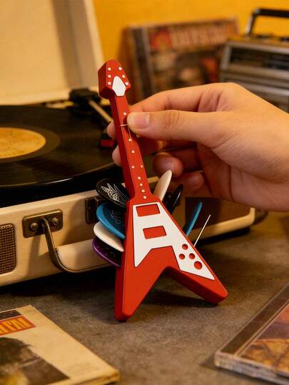1pc Guitar-Shaped Guitar Pick Holder Box, With Storage Space For Picks. Designed In Cool Guitar Shape To Enhance Musical Ambiance And Showcase Your Music Taste. Made Of Durable Material That Is Sturdy And Resistant To Tipping Over.