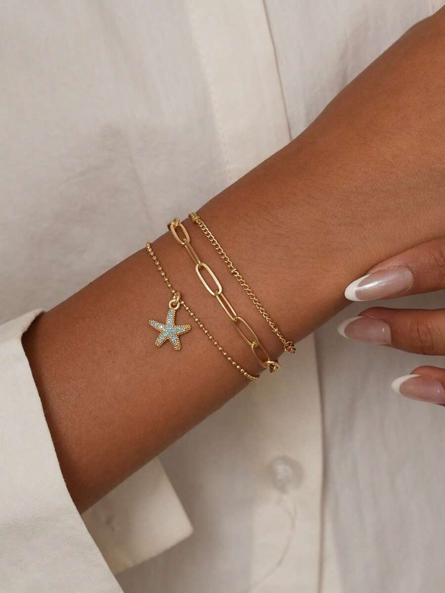 Nooxian 3pcs/Set Women Bracelets Set, Bohemian Summer Beach Style, Includes Golden Plated Multi-Layer Basic Chain, Beaded Chain, Satellite Chain, Paper Clip Chain, Bead Chain, Copper Inlaid Blue Zirconia Starfish Pendant, Multi-Layer Stacking Bracelets, Jewelry Gift - Yellow Gold - View 1