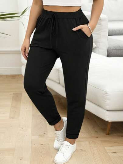 Plusstorlekar damleggings med fickor, minimalistiska och mångsidiga pendlarbyxor