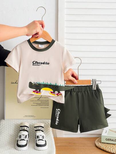 1 Set Baby Boy Summer Cartoon Outfit: Short Sleeve Tee With "Crocodile Dinosaur?" Letter & Dinosaur Print + Casual Green Shorts, Soft & Skin-Friendly Fabric, Colorblock Design, Suitable For Casual Occasions, Easy To Wear & Care, Fashionable Look
