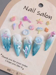 6/12格极光梦幻海洋主题美甲配件，包括海星、贝壳、椰子树片等美甲装饰，适合夏季海洋风美甲，包含美甲饰品、美甲宝石，适用于海滩、嘉年华和节日庆典。