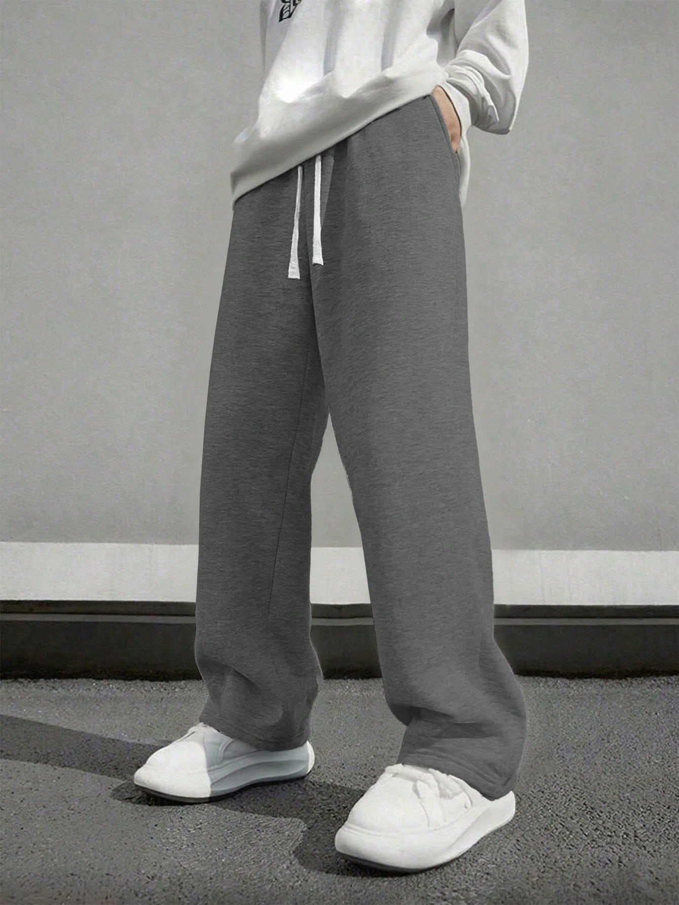 1 قطعة بنطلون رجالي فضفاض كاجوال أحادي اللون واسع...