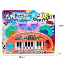Este juguete temático de Halloween está hecho de plástico, viene en colores brillantes. Juguete de Piano Electrónico de 10 Teclas con Gafas de sol para Niños - Instrumento Musical, Personajes de Animales Coloridos, Juego Interactivo para Rosa/Azul. Regalos de Navidad y Cumpleaños que fomentan el amor por la música, ayudando a cumplir sus pequeños sueños musicales, con juguetes musicales educativos innovadores como un teclado electrónico sin pilas para niñas. Piano electrónico de juguete con 10 teclas, piano simulado inteligente y multifuncional educativo con Gafas de sol para niños, juego interactivo para padres e hijos, regalo para niños y niñas, paquete de accesorios aleatorios, no incluye baterías. 1 pieza Mini teclado electrónico con Gafas de sol para niños, piano de dedos multifuncional, adecuado para que los principiantes de música aprendan el instrumento, juguete educativo musical para niños. - Naranja - Ver 2