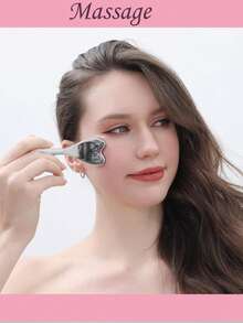 四件套面部护理套装包括：硅胶面膜冰格、大号不锈钢刮痧板、面部按摩滚轮、黑色礼品袋。可重复使用的家用按摩SPA套装，送给家人和女朋友的绝佳礼物。 - 彩色 - 查看 5