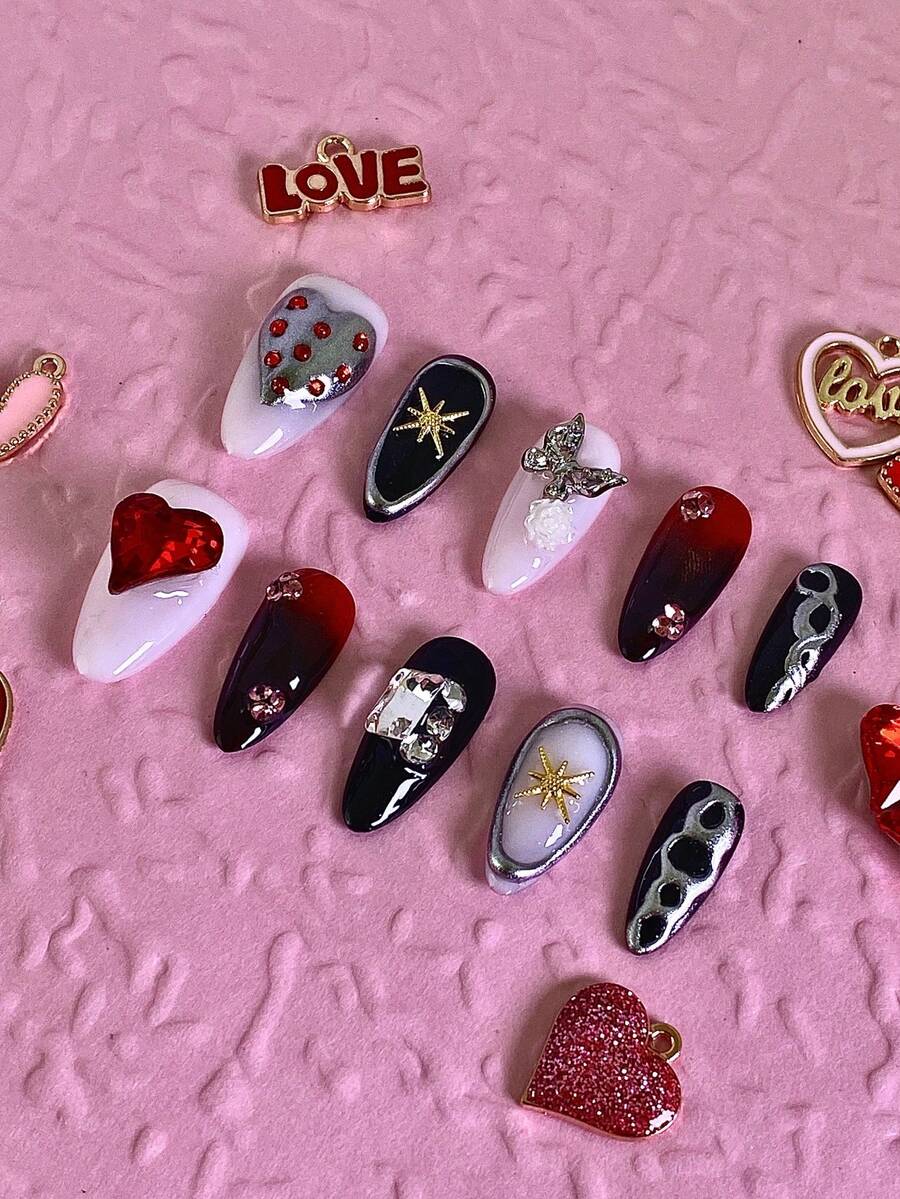 10片装女士美甲贴纸，杏仁形甲片，精致手工美甲，以红色、黑色和白色为主色调，包含爱心、星星、花朵、蝴蝶结和树叶等元素。设计时尚别致。这款全覆盖、可重复使用的亚克力亮面假指甲套装包含指甲胶水，适合情人节、生日派对、日常佩戴、收藏或作为礼物。