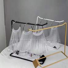 1个桌面小型饰品展示架，适用于珠宝店展示唇彩、口红、钥匙扣、项链、耳环等商品。