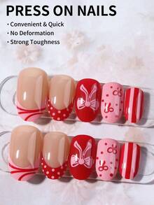 Bộ 24 móng tay giả acrylic ngắn hình oval dễ thương, thiết kế nơ và chấm bi kiểu Pháp, bao gồm: 1 gel dán và 1 dũa móng, thích hợp cho lễ tình nhân và kiểu móng Pháp, phù hợp cho phụ nữ và bé gái, dùng hàng ngày và dự tiệc. - Xem 2