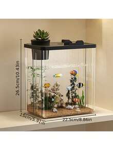 1个长方形高透明度鱼缸，带手机支架，非常适合家庭客厅、书房和办公桌等家居装饰。