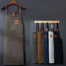 一件防水防油围裙，男女通用，配有方便的口袋——非常适合在超市、餐厅、水果店、奶茶店等场所使用。