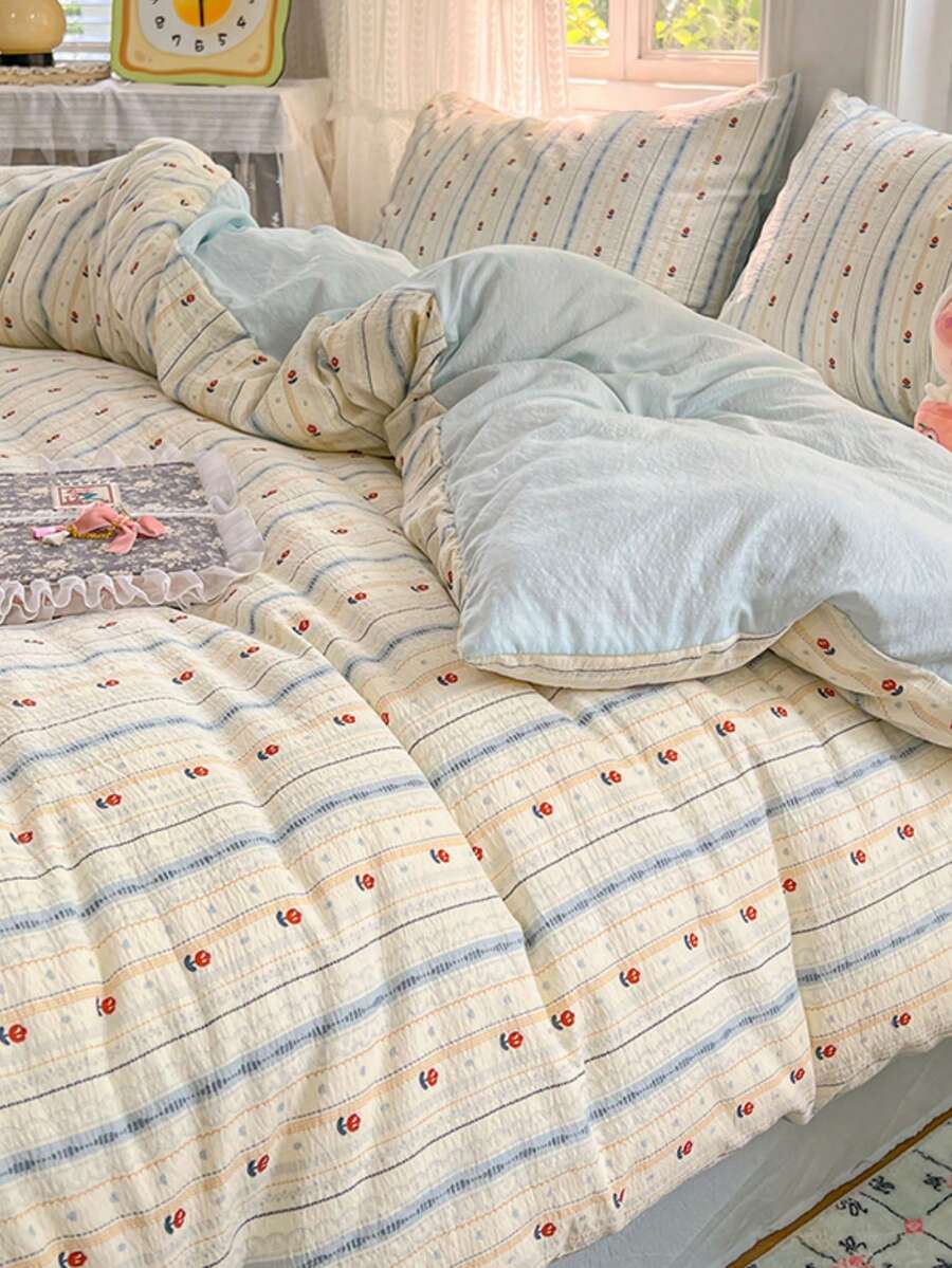 浅蓝色浪漫条纹碎花床上用品套装，清新柔和田园风四件套，包含1个被套、1个床单和2个枕套，纯色床单，超柔软涤纶面料，高密度优质材料，拉链设计，温馨甜美的家居装饰，被套和枕套不含填充物。 - 淺藍色 - 查看 1