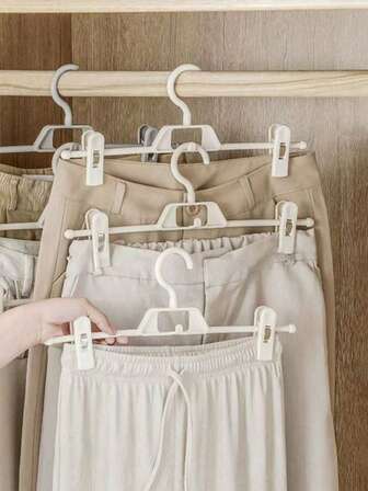 1 st. byxhängare i plast, sömlös halkfri klämma, förvaringsställ för heminredning, klädhängare för rumsinredning, klämhängare, organisatör, klädklämma, ställning, kjolhängare, klädförvaring, lämplig för garderobsorganisation, beige - en storlek