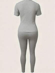 Bộ 2 món gồm áo thun ngắn tay cổ tròn in họa tiết Paris và quần skinny, thích hợp cho nữ mùa hè. - Xám - Xem 2