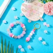 30颗色彩鲜艳的12毫米和15毫米透明硅胶珠，内含彩色圆点，可用作隔珠和硅胶焦点珠，适用于DIY珠宝制作，时尚装饰珠，可用于项链、手链、挂绳等——男女皆宜的工艺材料套装，适合工艺爱好者、学生和办公人士，也是理想的办公礼品之选。