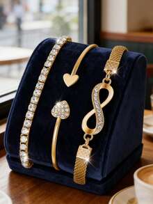 4件套奢华女士石英表套装，女士黄金配饰全水晶首饰套装（包括全水晶金属表带石英表、无限符号/心形/水晶手链），采用全金全水晶设计，结合优雅的无限符号和心形装饰元素。 - 金色 - 查看 5