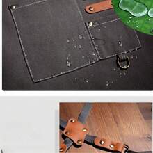 一件防水防油围裙，男女通用，配有方便的口袋——非常适合在超市、餐厅、水果店、奶茶店等场所使用。