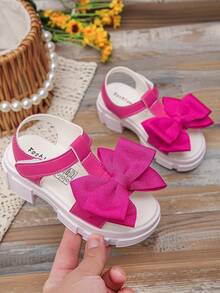 Giày sandal nơ to mới cho bé gái mùa xuân và hè, đế xốp dày chống trượt, hở mũi, kiểu La Mã. - Màu Hồng Tươi - Xem 1