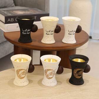 1个阿拉伯风格香炉。树脂材质，饰有阿拉伯文字和新月图案。经典的黑、白、米色配色，适合各种家居装饰风格。适用于客厅、卧室、餐厅、茶室、瑜伽室、聚会、冥想等场所。实用桌面摆件。斋月及其他节日馈赠亲友或自用皆宜。