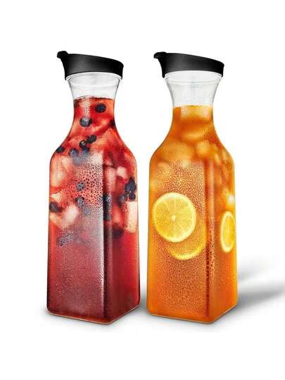 A Square-Water Bottle With A Flip-Top Lid, Made Of Transparent Plastic And Featuring Shockproof Properties. It Is Suitable For Holding Beverages Such As Water, Iced Tea, Juice, Lemonade, Milk, Cold Brew Coffee And Mozambique Cocktails. A Must-Have Kitchen For Festive Decorations, High-Quality Kitchen Home.