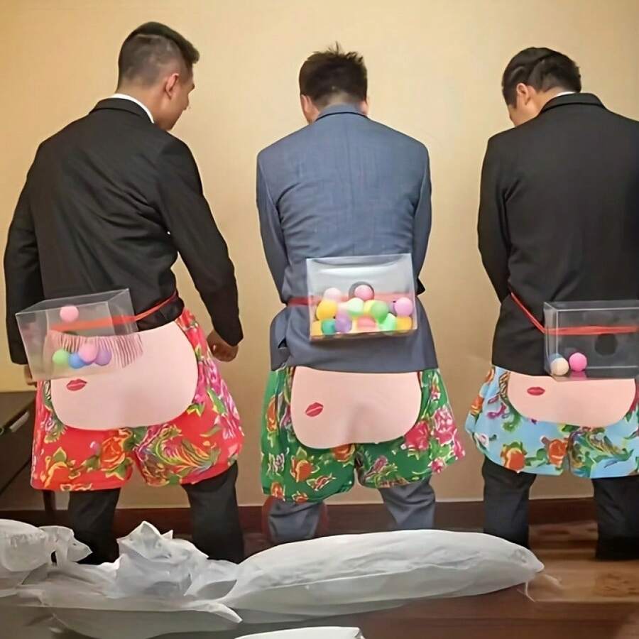 一套包含：30个球、1个盒子、1条腰带——一款适合全家室内外娱乐的趣味派对游戏，是生日、周年纪念日、夏季、万圣节和圣诞节庆祝活动的完美之选。“快乐小鸡下蛋”游戏。 - 彩色 - 查看 1